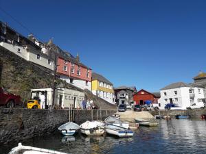 a group of boats docked in a body of water at Wild Air Guest House in Mevagissey