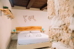 A bed or beds in a room at Apartment in the Heart of the City