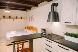 A kitchen or kitchenette at Apartment in the Heart of the City