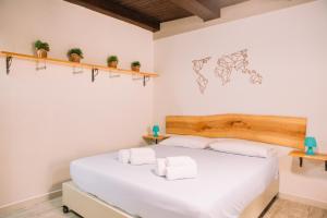 A bed or beds in a room at Apartment in the Heart of the City