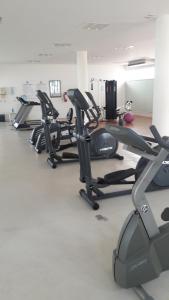 a row of exercise bikes in a gym at Apartamento Pelicanos, Nuevo Vallarta in Nuevo Vallarta