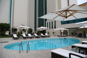 The swimming pool at or close to Delfines Hotel & Convention Center