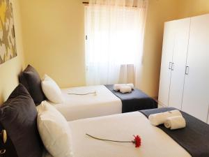 Katil atau katil-katil dalam bilik di Villa Mucifal A
