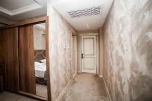Postel nebo postele na pokoji v ubytování Boutique Hotel Mimino