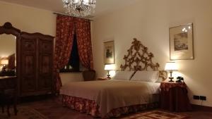 Posteľ alebo postele v izbe v ubytovaní B&B Castello di Camerletto
