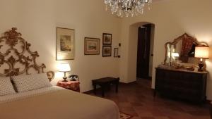 Posteľ alebo postele v izbe v ubytovaní B&B Castello di Camerletto
