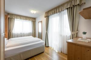 Posteľ alebo postele v izbe v ubytovaní Residence As'Odei