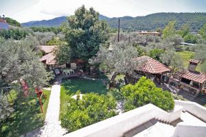 an aerial view of a house with a yard at Villa Angela in Vourvourou