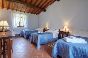 Postelja oz. postelje v sobi nastanitve Borgo Santa Maria in Valle