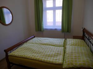 Posteľ alebo postele v izbe v ubytovaní Moskevská 40