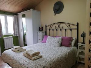 Postel nebo postele na pokoji v ubytování Casa de la abuela Bego