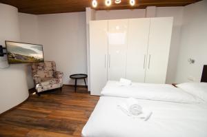Posteľ alebo postele v izbe v ubytovaní Penthouse EightyOne incl SUMMER CARD by All in One Apartments