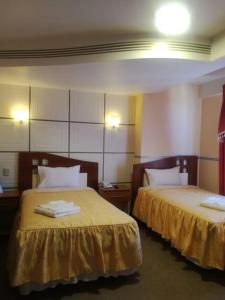 Een bed of bedden in een kamer bij Hotel "VIRGEN DEL SOCAVON"