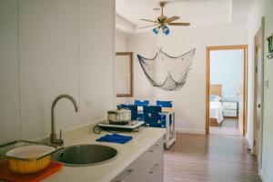 Voodi või voodid majutusasutuse Saipan Emerald Villa toas