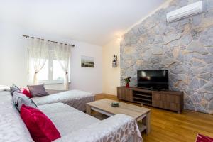TV a/nebo společenská místnost v ubytování Urban Luxury Suites Juricevic