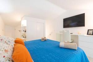 Posteľ alebo postele v izbe v ubytovaní Lidia & Paco Home two bedrooms beachfront