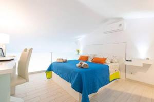 Posteľ alebo postele v izbe v ubytovaní Lidia & Paco Home two bedrooms beachfront