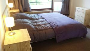 Postel nebo postele na pokoji v ubytování Chamrousse 1750 - Le Taillefer - Appartement classé 3 étoiles