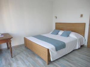 Letto o letti in una camera di Le Bastidon de CUCURON