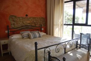 Posteľ alebo postele v izbe v ubytovaní Arianella Holiday Home Penedes