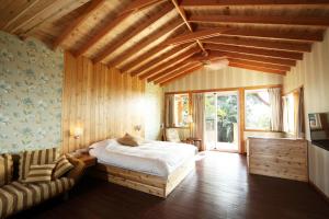 Postel nebo postele na pokoji v ubytování Country Story B&B + 37 fotografií