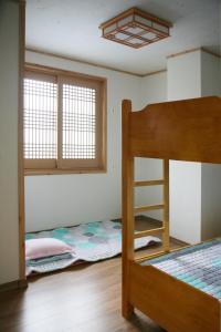 Letto o letti in una camera di Wansangolgh Guest House