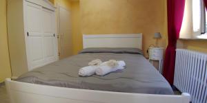 A bed or beds in a room at Residenza Manfredi