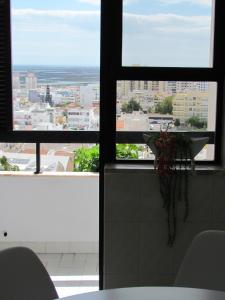 A balcony or terrace at In Faro with Sea View