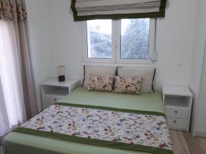 Ένα ή περισσότερα κρεβάτια σε δωμάτιο στο Villa Irini - Cretan Luxury Villa with Amazing View