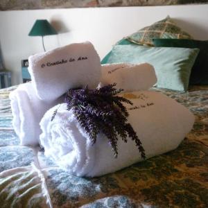 Uma cama ou camas num quarto em O Cantinho da Ana