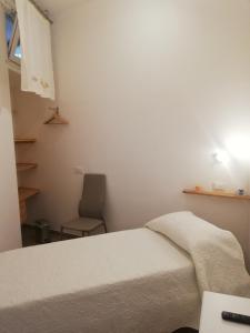 A bed or beds in a room at Il lago del Mugello B&B