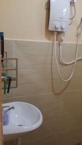 Et badeværelse på IsMa Lumut Homestay