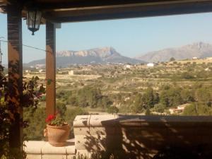 a view of a mountain range from a window at Beautiful Benissa Views in Benissa
