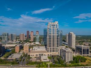 an aerial view of a city skyline at The Post Oak Hotel in Houston