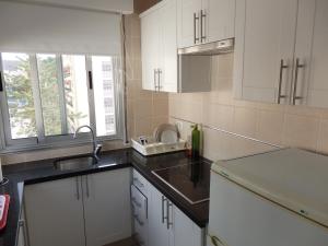 Kuchyň nebo kuchyňský kout v ubytování Apartamento Los Cristianos
