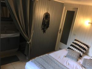 Postel nebo postele na pokoji v ubytování Appartement Sevrier terrasse et jardin