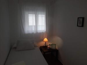 Łóżko lub łóżka w pokoju w obiekcie Cristinas Palace