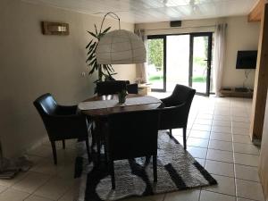 Posezení v ubytování Appartement Sevrier terrasse et jardin