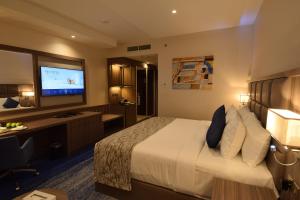 TV a/nebo společenská místnost v ubytování Paradise Elite Hotel Al-Tahlia Jeddah