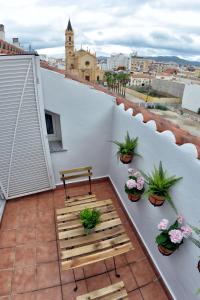 A balcony or terrace at WonderStays Apartamentos Maribel