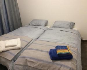 Ein Bett oder Betten in einem Zimmer der Unterkunft Le Président 2
