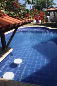 Der Swimmingpool an oder in der Nähe von Villa Tropicale