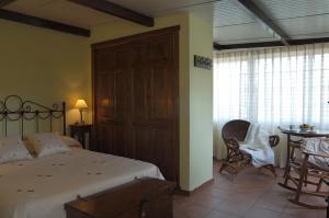 Cama o camas de una habitación en La Buena Siesta