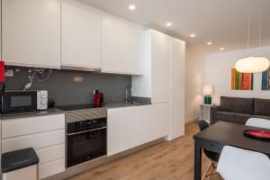 Dapur atau dapur kecil di Santo António House - Exclusive Apartment