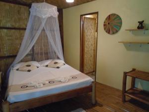 Katil atau katil-katil dalam bilik di Nypa Style Resort Camiguin