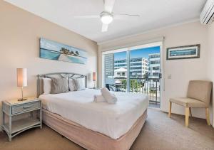 Postel nebo postele na pokoji v ubytování Sailport Mooloolaba Apartments + 37 fotografií