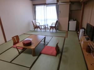 TV a/nebo společenská místnost v ubytování Hotel Daimatsuso