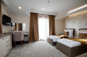 Hotel Fobra客房内的一张或多张床位