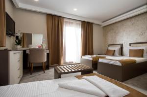 Hotel Fobra客房内的一张或多张床位