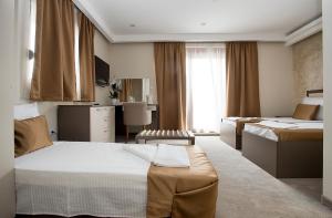 Hotel Fobra客房内的一张或多张床位
